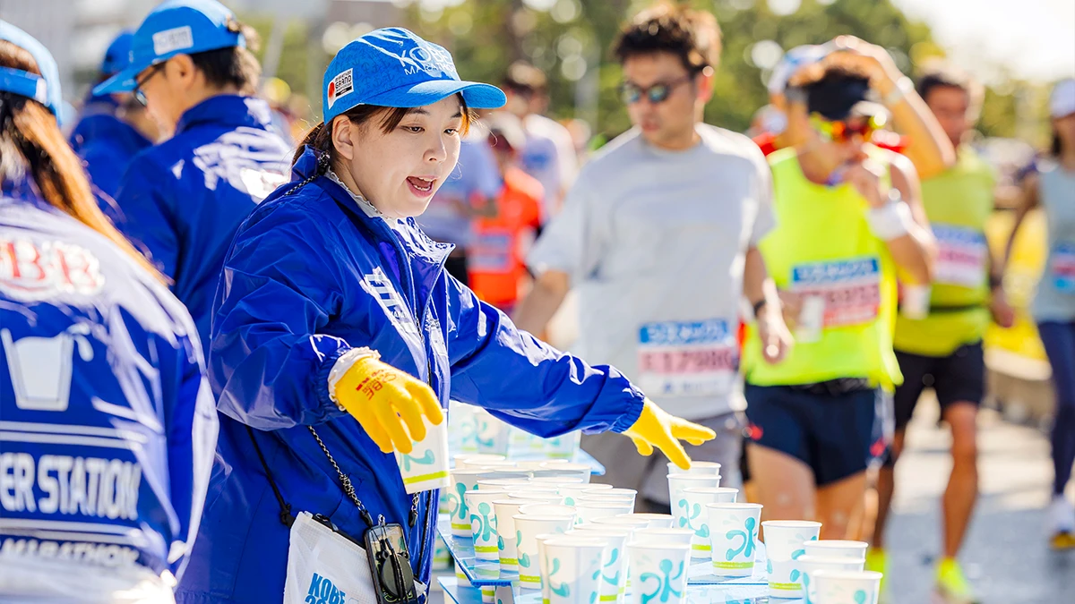 Water-supply volunteer at Kobe Marathon (Japan)