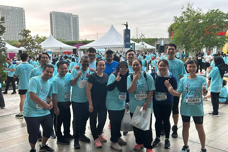Participating in a charity run (Malaysia)